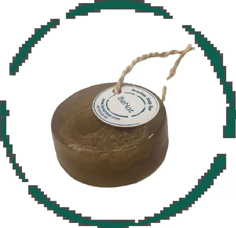 Soap bar with green clay, bamboo, and green tea ingredients, featuring a loofah on a rope.