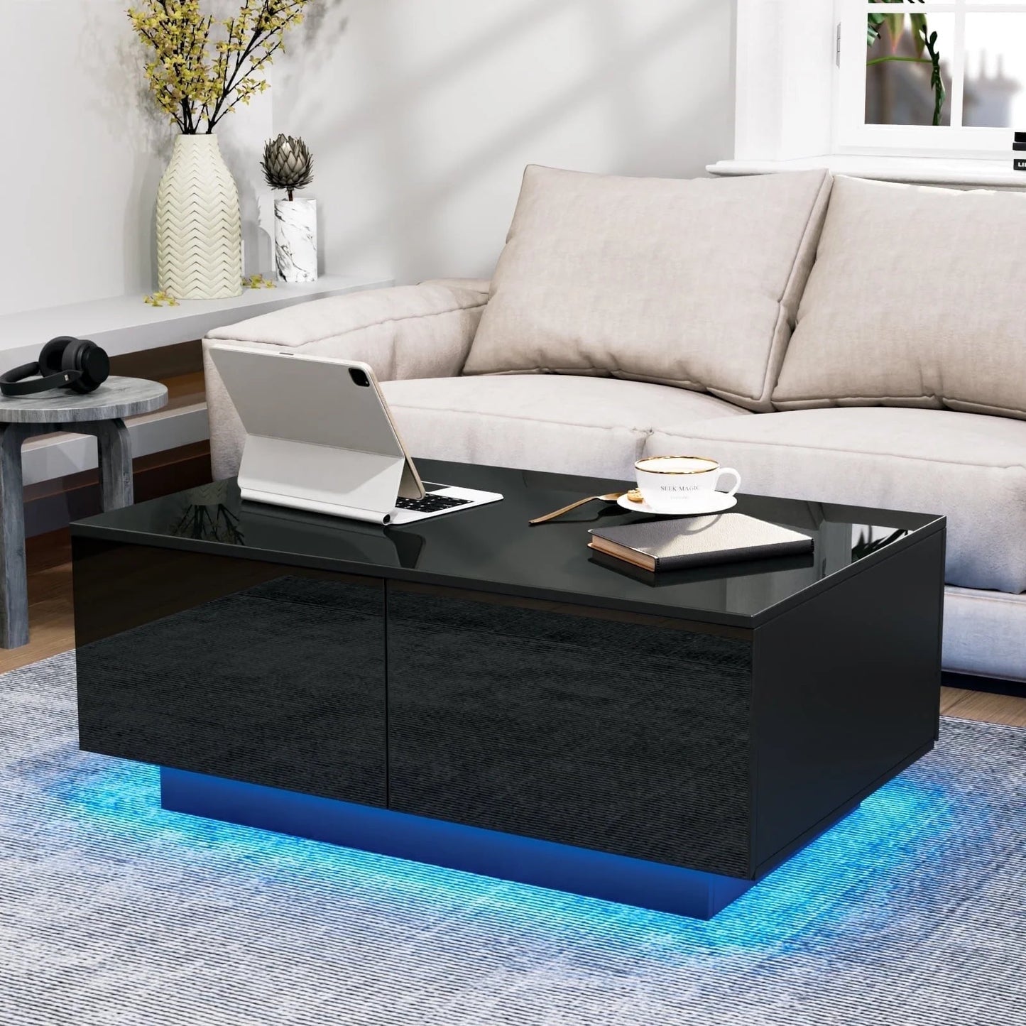 Black high gloss coffee table with 4 drawers and color-changing LED lights, perfect for modern living rooms.