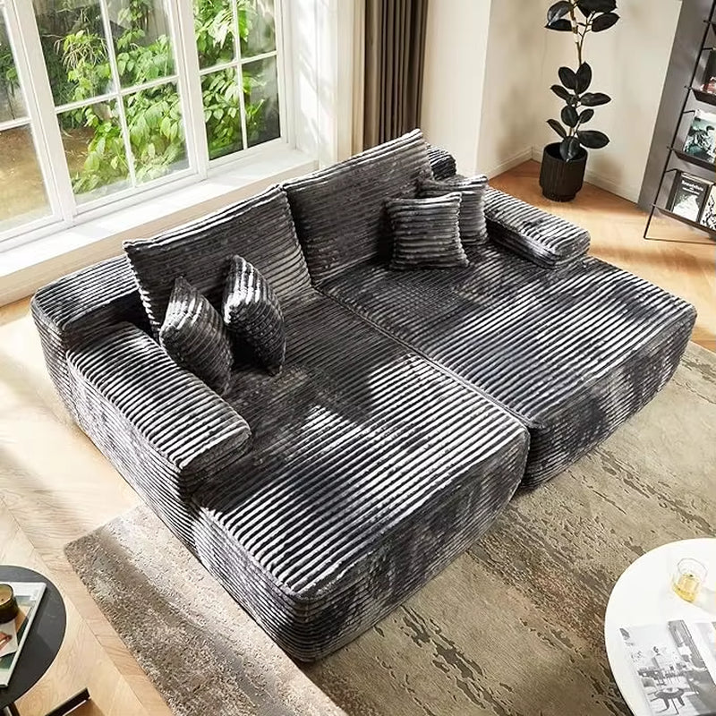 80" cloud sectional couch with plush corduroy fabric in a modern living room setting.