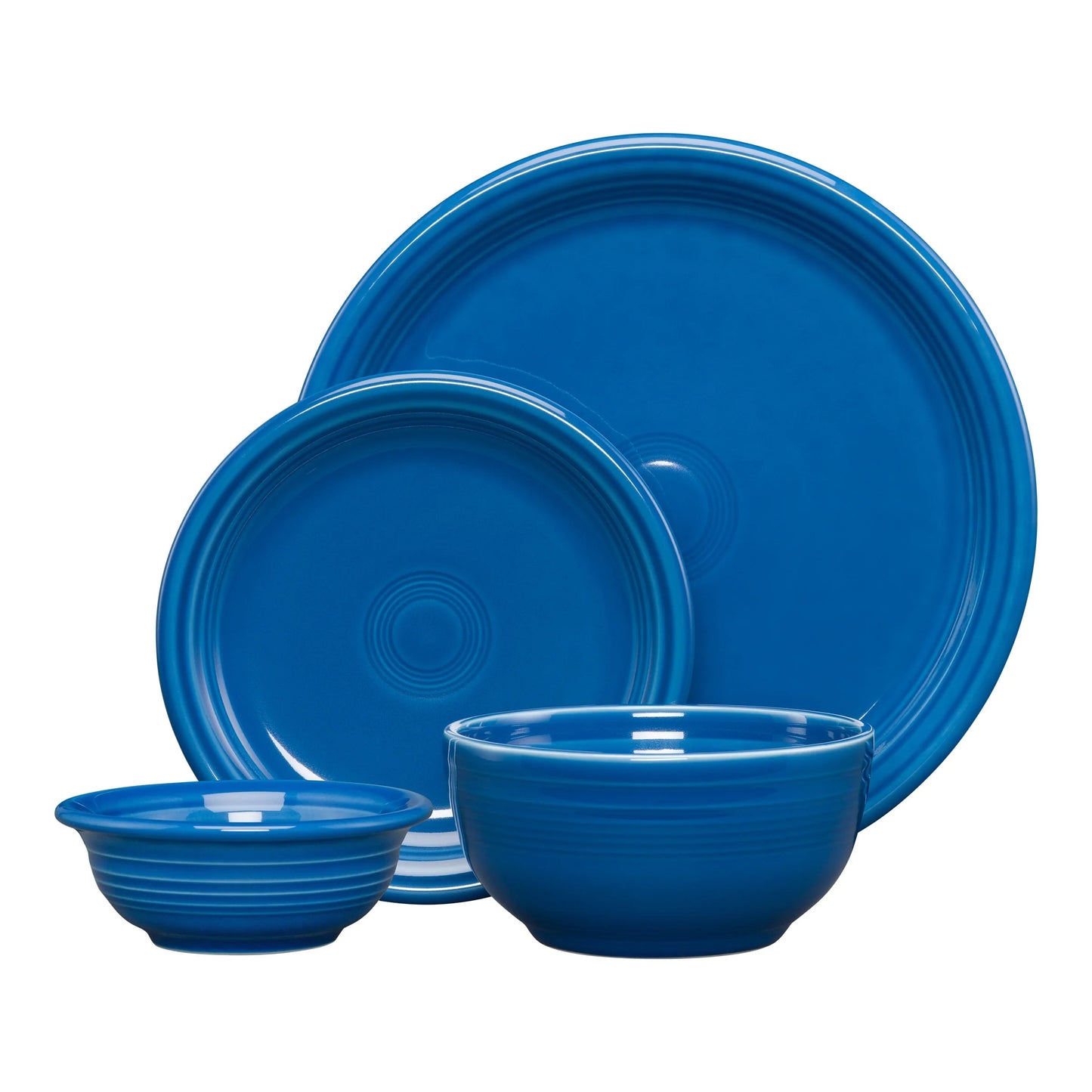 Coupe Bistro 4Pc Ceramic Dinnerware Set in Lapis with plates and bowls.