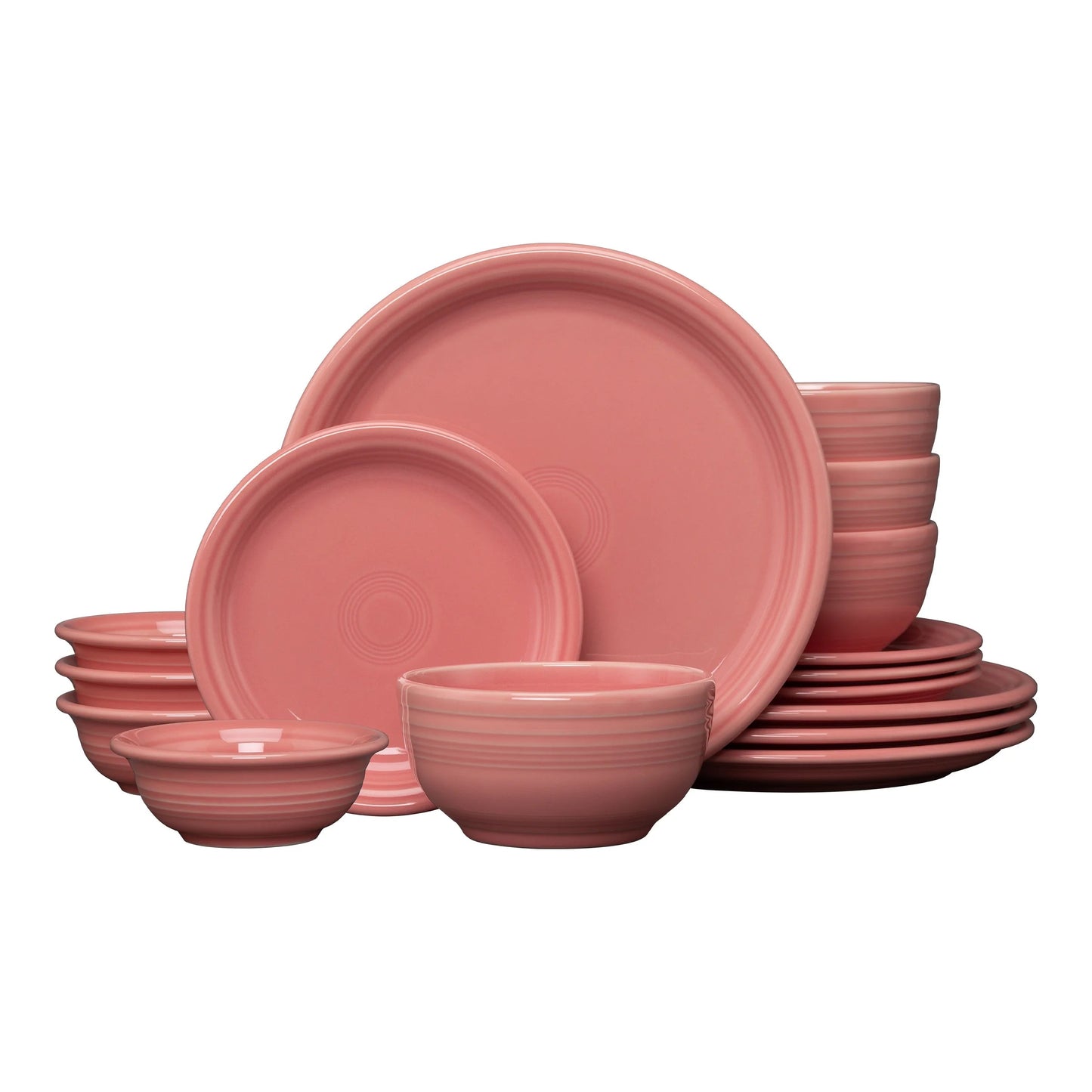 Coupe Bistro 16-piece ceramic dinnerware set in peony color, featuring plates and bowls.