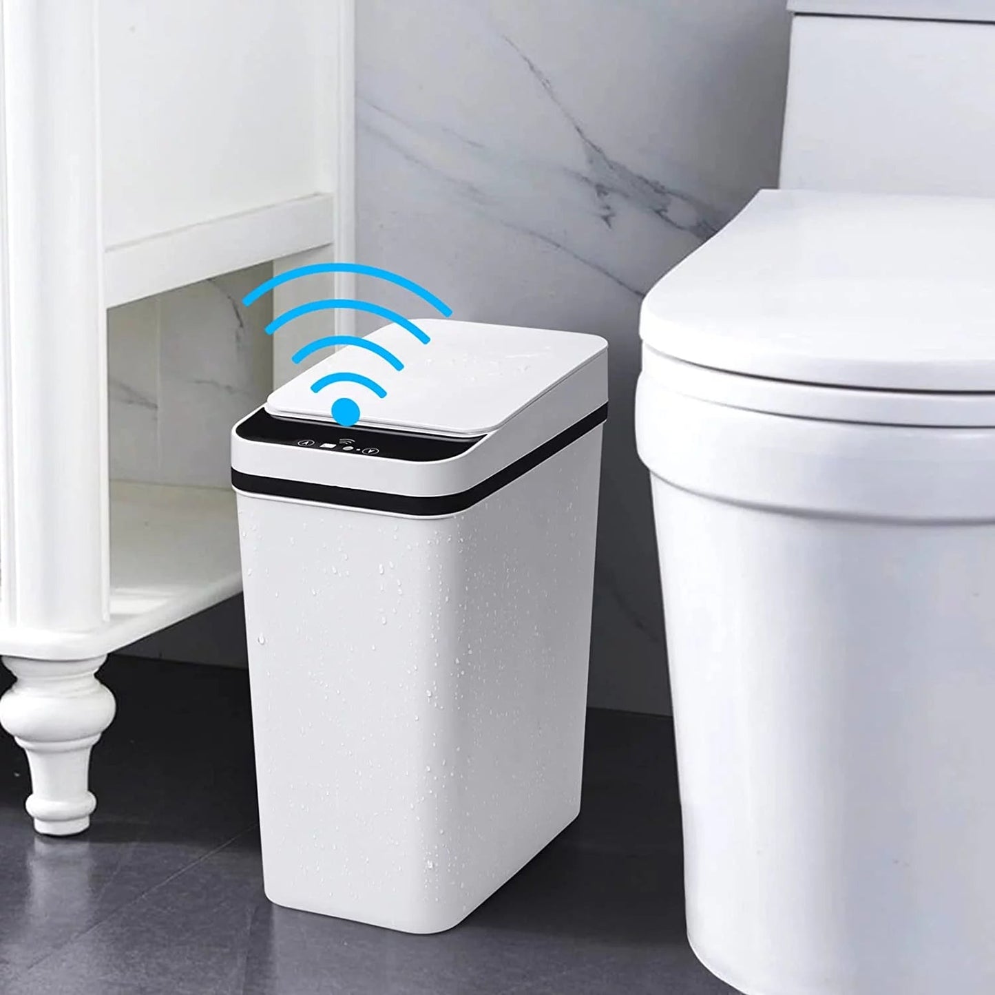 White 2.5 gallon smart touchless trash can with lid in bathroom, motion-sensor activated.
