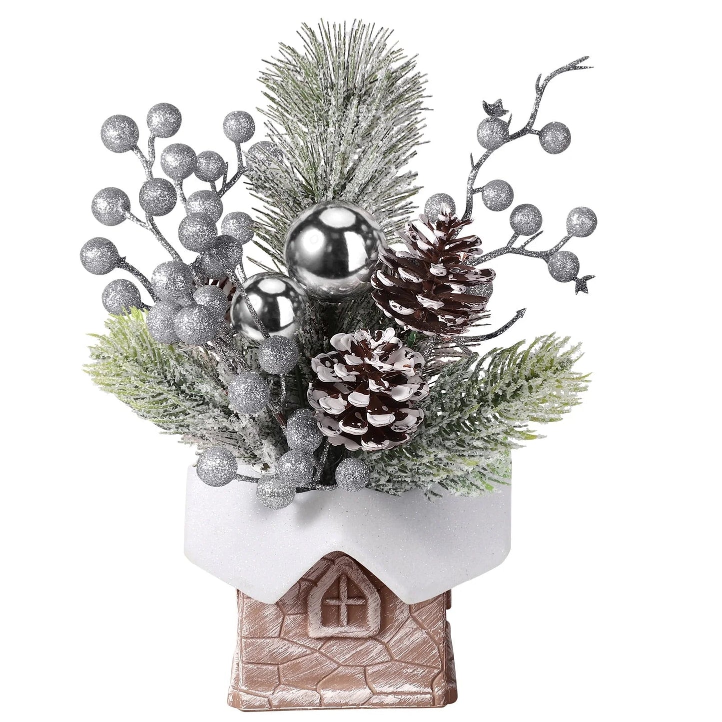 Silver mini Christmas tree with pinecones and ornaments in a stump-shaped base for tabletop decor.
