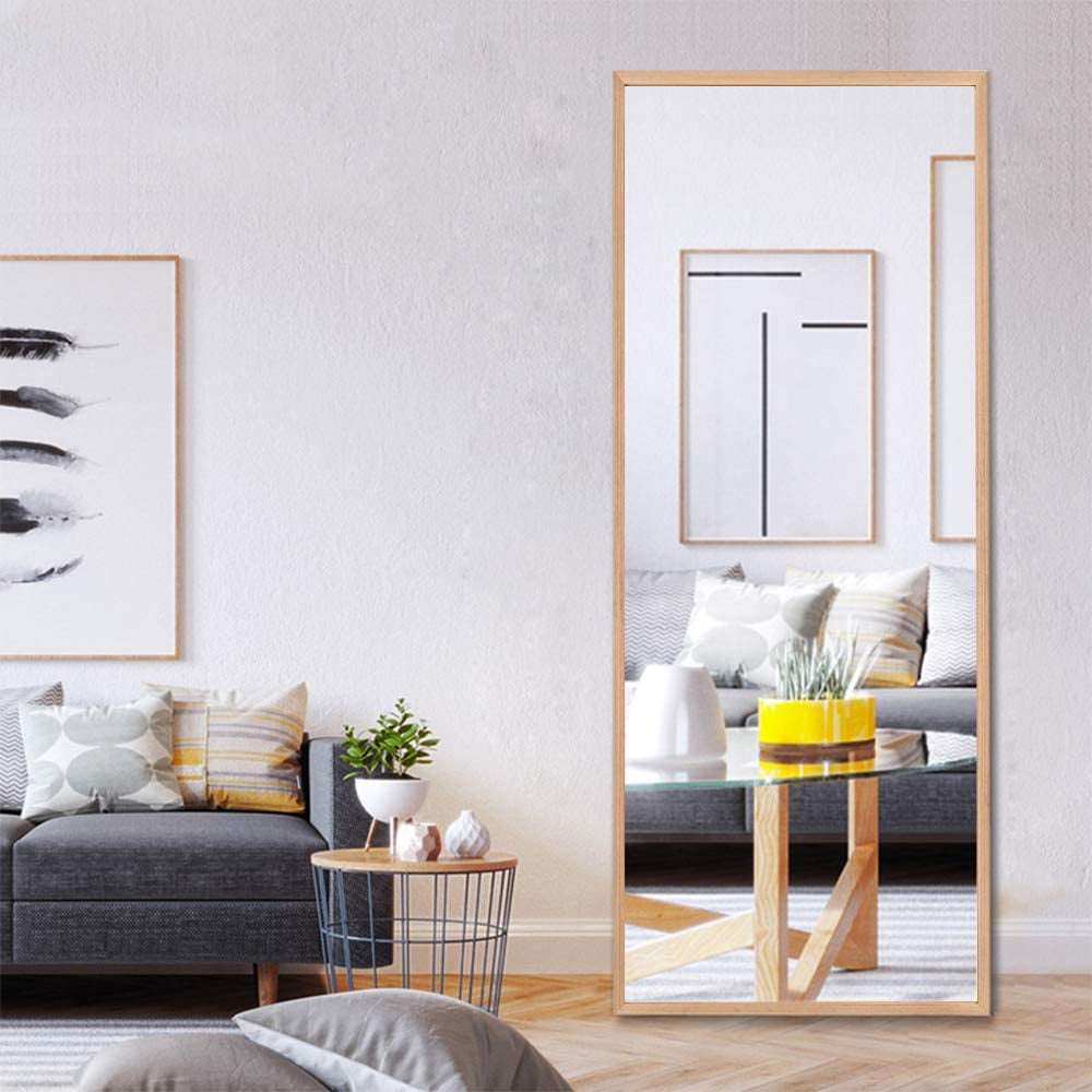 65"x22" full length mirror with solid wood frame in modern living room setting.