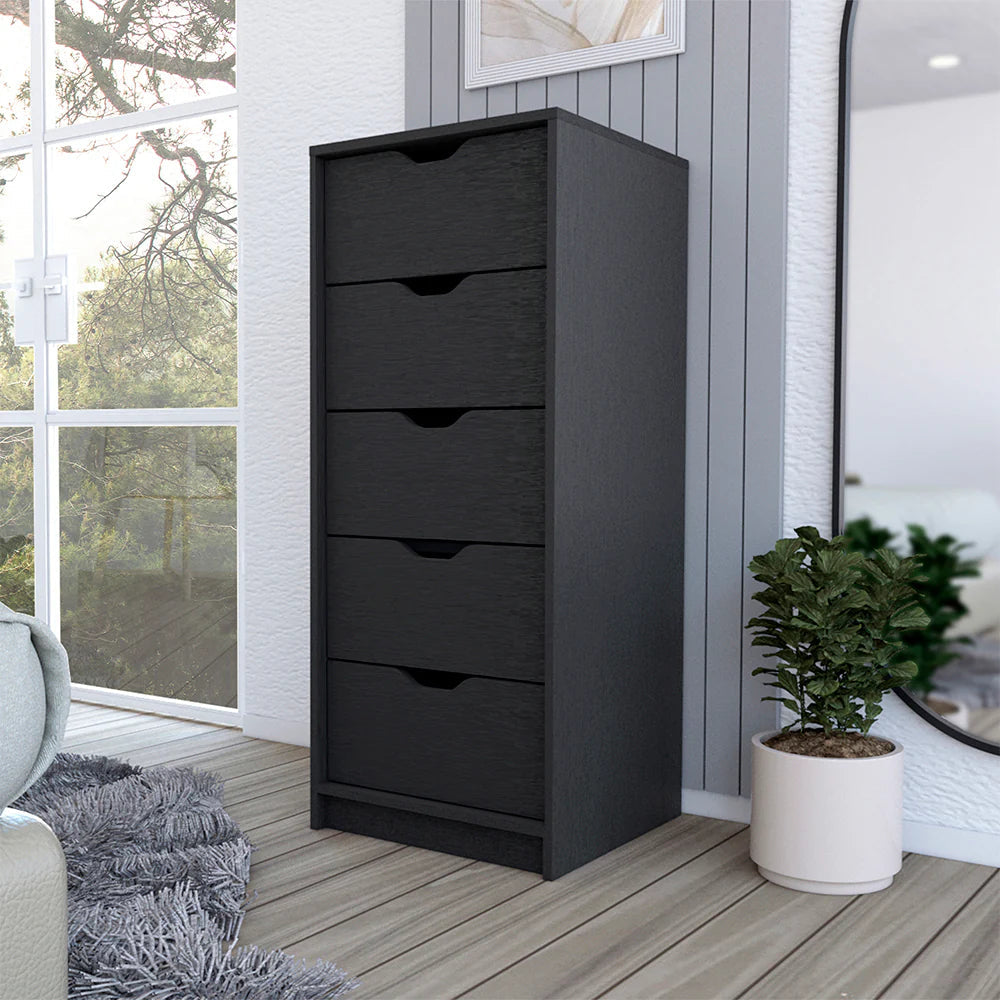Five drawer narrow black dresser with wengue finish in bedroom setting.