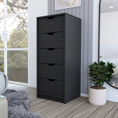 Five drawer narrow black dresser with wengue finish in bedroom setting.